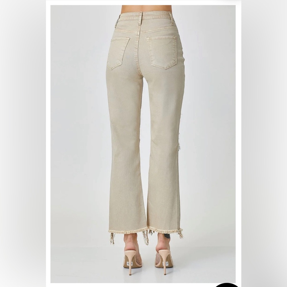 NWT- high rise, straight leg with distressed knee.